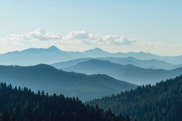 Obraz premium Vertical blue nature banner showing layered silhouettes of mountain ranges under different weather conditions