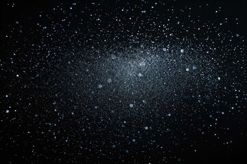 Obraz premium Millions of Stardust Particles in a Snowstorm, Captured Falling Like Rain and Snowflakes