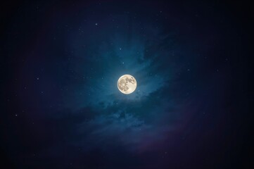 Lunar glow brightening the dark night sky under a full moon