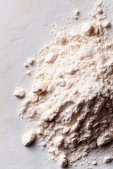 Heap of Flour on White Surface Overhead Shot for Baking Cookbook or Culinary Ingredient Stock Photo