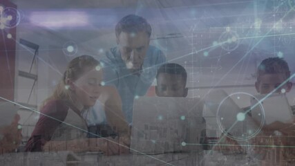 Animation of network of connections over caucasian teacher and diverse group of students - Powered by Adobe