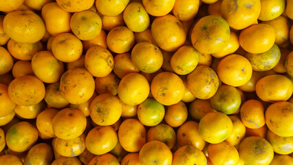 Fresh Oranges Piled Together at Local Market