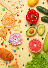 healthy foods and unhealthy foods on a colored background close-up top view.. Vertical photo format