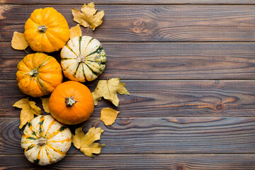 Autumn composition. Pattern made of dried leaves and other design accessories on table. Flat lay, top view