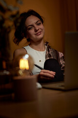 professional designer woman working at home workspace using digital graphic tablet and laptop