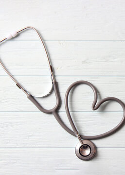 stethoscope on color background close-up. Health, medicine. Vertical photo format