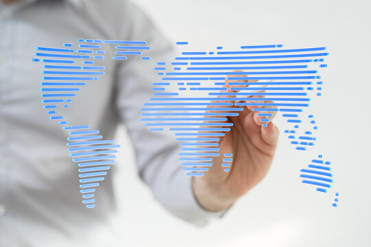 Stock photo of a person drawing a world map, symbolizing global reach and networking.