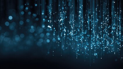 Abstract digital rain.  Light streams of blue particles cascade down a dark background, interspersed with soft bokeh