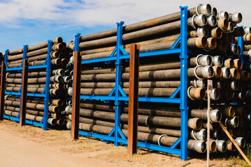 Industrial construction Pipes Stacked on Storage Rack