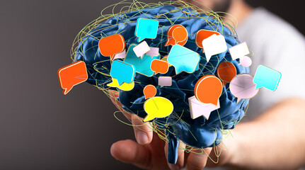Conceptual image of a brain with colorful speech bubbles, representing communication, ideas, and thoughts.