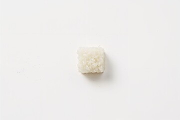 Organic rice cube on a transparent surface, culinary, nutrition, natural meal, cooking essentials