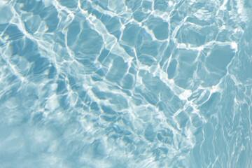 Fototapeta premium High-resolution image of a blue water surface with light reflections. Perfect for backgrounds, websites, and design projects.