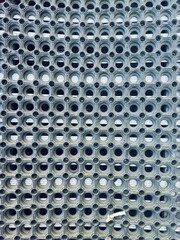 Dynamic industrial rubber matting surface pattern offering superior grip and safety for busy commercial environments