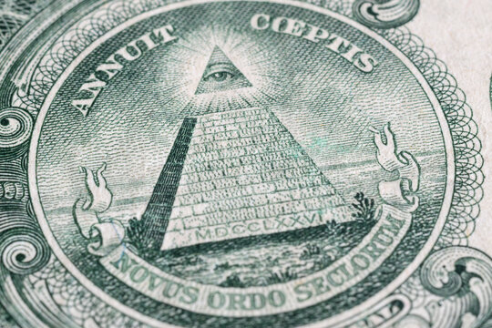 Close up of pyramid and all-seeing eye on American dollar, detail from American banknote of one dollar