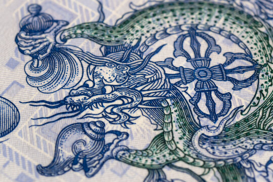 Thunder dragon on Bhutanese ngultrum banknote close up, detail from bill on one ngultrum