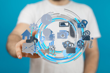 Person using a futuristic interface with app icons.  Perfect for technology, innovation, and digital concepts.