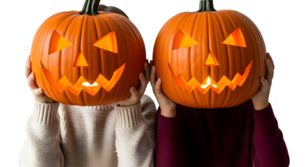 Two People Holding Jack-o'-lanterns in front of their faces for Halloween