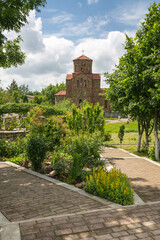 View of the park and the building of orthodox church