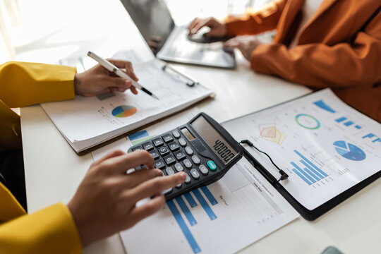 Businesswoman meeting with consultant discussing financial situation analysis in business and marketing report. Financial planning, accounting and business strategy.