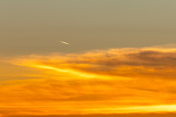 Evening in the Sumba Savanna unites the rolling hills, an ancient church, and a golden sky