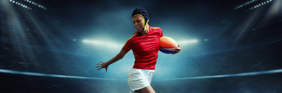 Female rugby player sprinting with ball on 3D stadium field under bright lights. Banner. Concept of speed, determination, teamwork, women in sports and high-intensity athletic competition. - Powered by Adobe