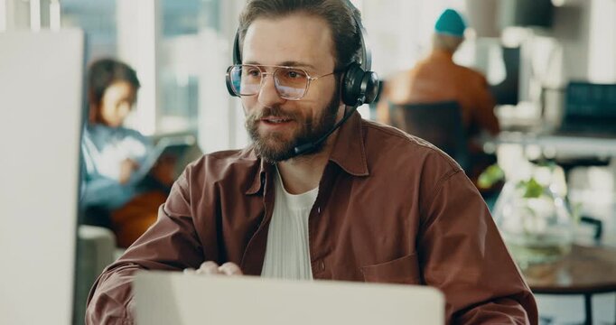 Man, headset and explain with computer at call centre for customer service, online query and advice. Agent, mic and pc for consultation, client support and crm representative of technical assistance