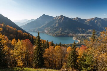 Charming fall scenery of a serene mountain lake at dawn, bathed in early sunlight with alpine peaks in the background.