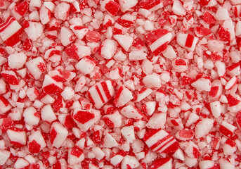 Close-up of crushed peppermint candy canes for holiday baking.