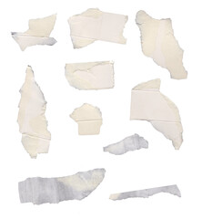 Scattered torn paper pieces on a black background abstract texture