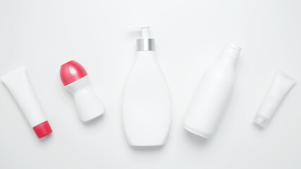 Skin care and beauty concept. Cosmetic beauty products. Bottles and tubes with branding mock up