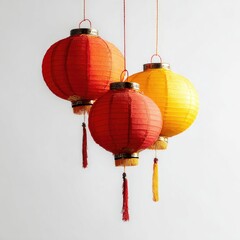 Obraz premium Three Chinese lanterns, red and yellow, hanging