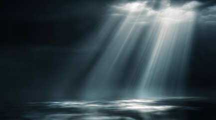 Dramatic light beams piercing dark clouds above a still water surface