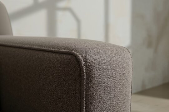 Close-up view of sofa stitching. Design concept. Sofa showcase.