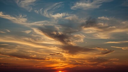 Dramatic sky at dusk with vibrant blue and orange clouds and an abstract sunset view
