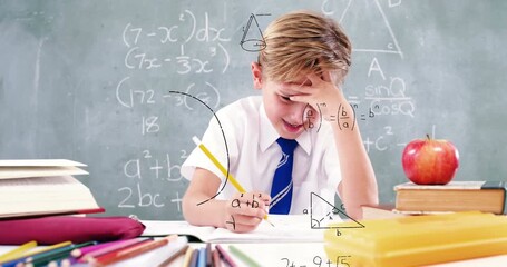 Animation of math formulas over focused caucasian boy doing homework - Powered by Adobe