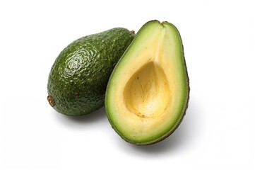 Entire and halved avocado on a white background