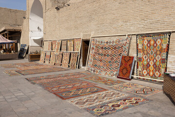 the carpet on sale outside Toqi Sarrofon which in Persian as money changers dome