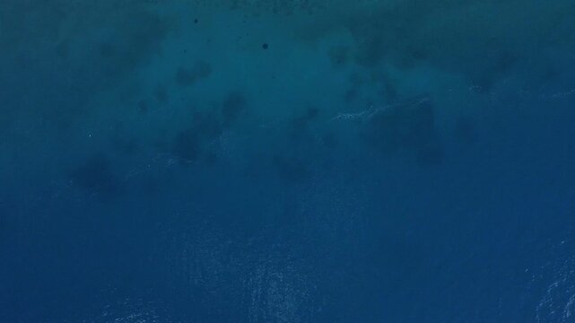 Aerial Mediterranean Sea top down near Paralia Arvantias beach in Nafplio Greece