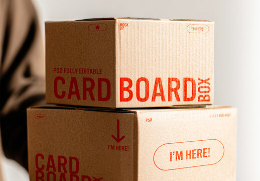 Cardboard Shipping Boxes Mockup in Hand