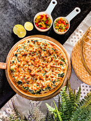 Delicious spinach cheese pizza with golden melted cheese and fresh green spinach topping.