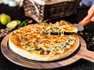 A hot pizza with gooey, stretchy melted cheese, freshly baked with a crispy golden crust.