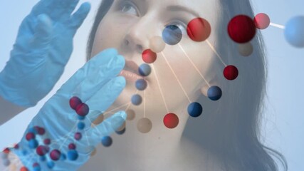Animation of dna rotating over hands of doctor preparing caucasisn woman to plastic surgery - Powered by Adobe
