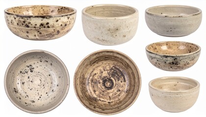 Set of rustic ceramic bowls with natural textures isolated on a white background 