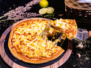 Delicious corn cheese pizza with golden melted cheese and sweet corn topping.