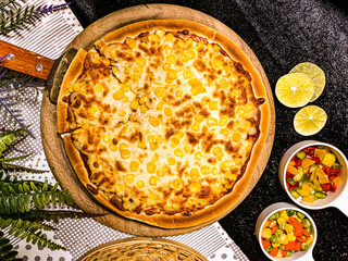 Delicious corn cheese pizza with golden melted cheese and sweet corn topping.