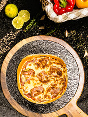 Bacon cheese pizza with melted cheese topping, delicious and savory.