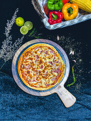 Bacon cheese pizza with melted cheese topping, delicious and savory.