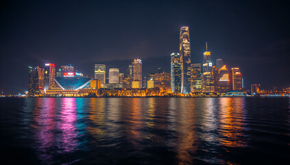 Obraz premium Stunning Nighttime Cityscape with Bright Skyline Lights
