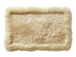 Luxurious sheepskin rug casting shadows, exhibiting fluffy texture, presented on an isolated
