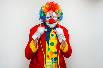 Clown with fists raised playfully